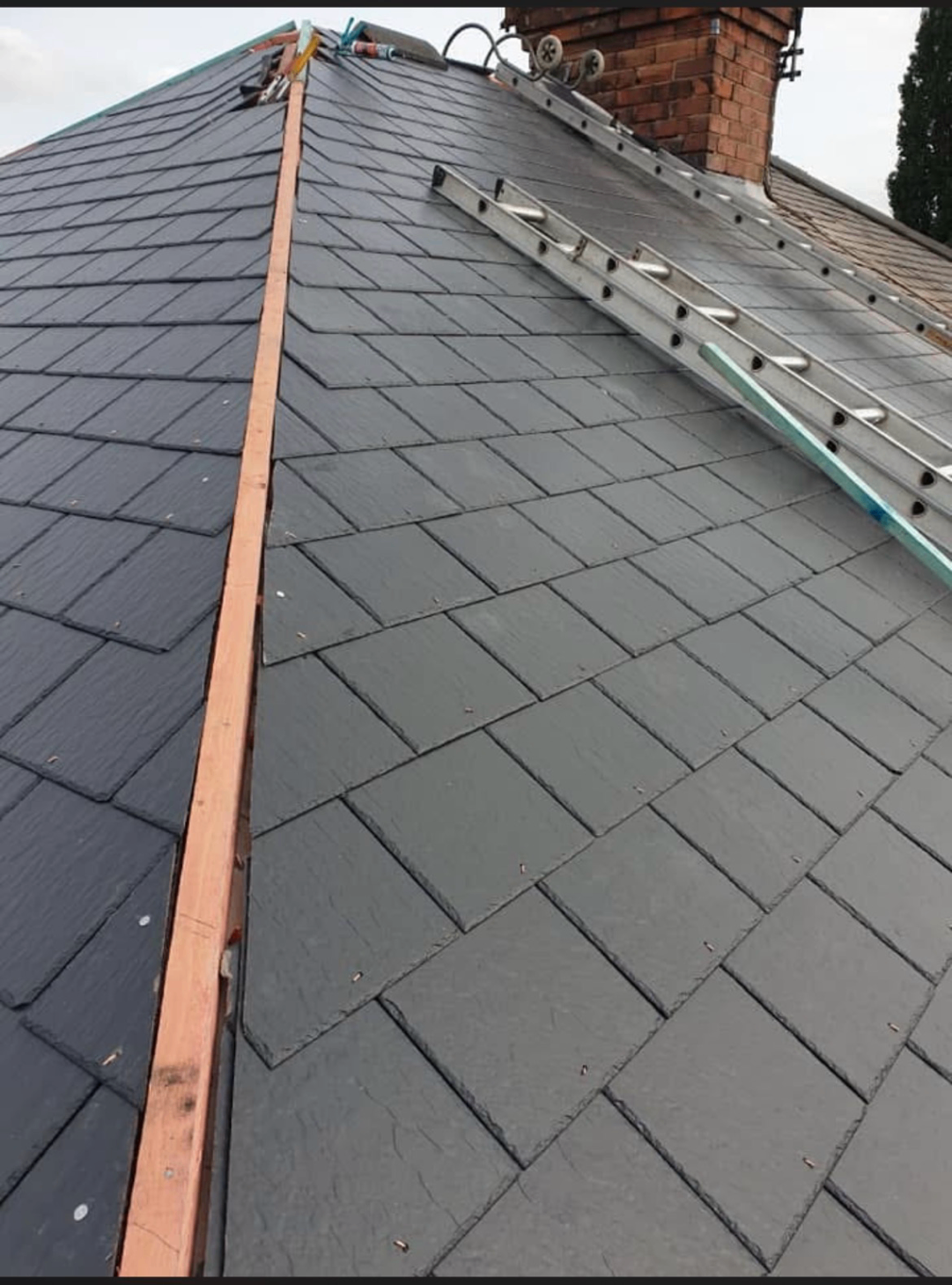 Tiled pitched roof during repair work