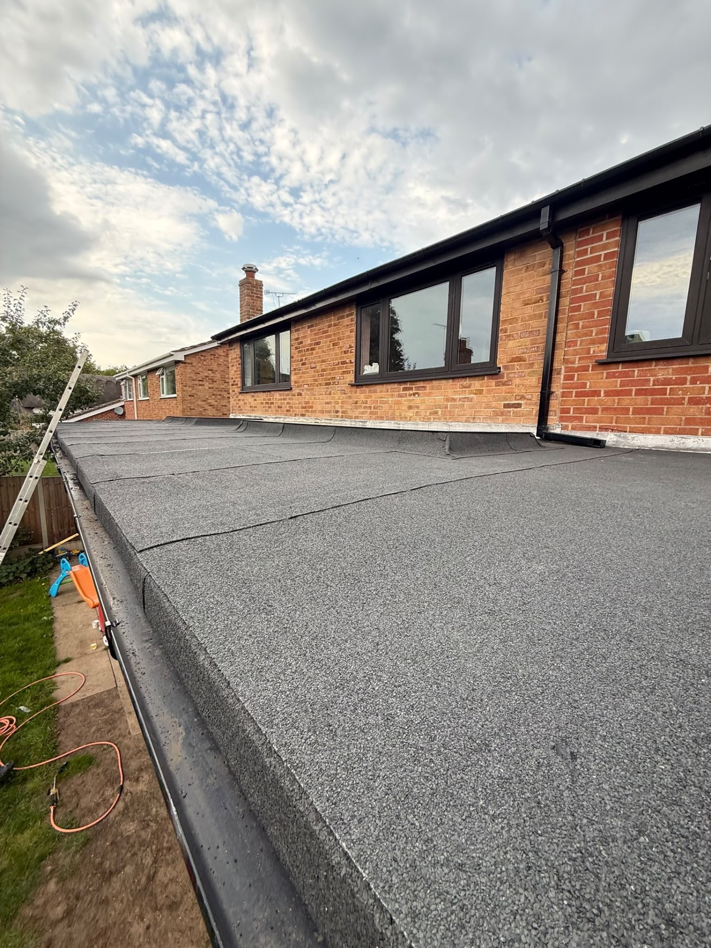 Completed three-layer torch-on felt flat roof in Coventry